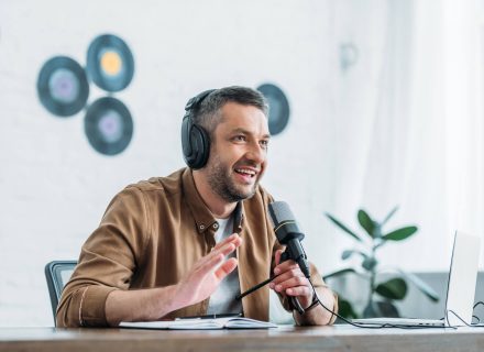 cheerful-radio-host-gesturing-while-recording-podc-2021-09-03-07-42-01-utc.jpg